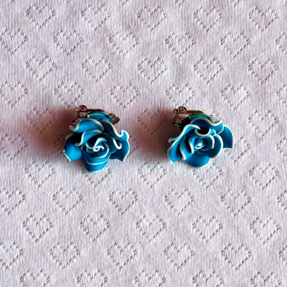 blue clip on rose earrings